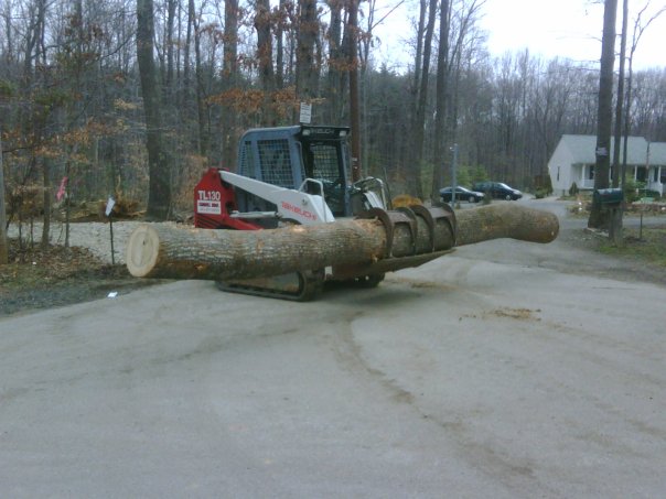 Carroll Bros. Contracting Moving logs to haul to the lumber mill - Crofton, MD