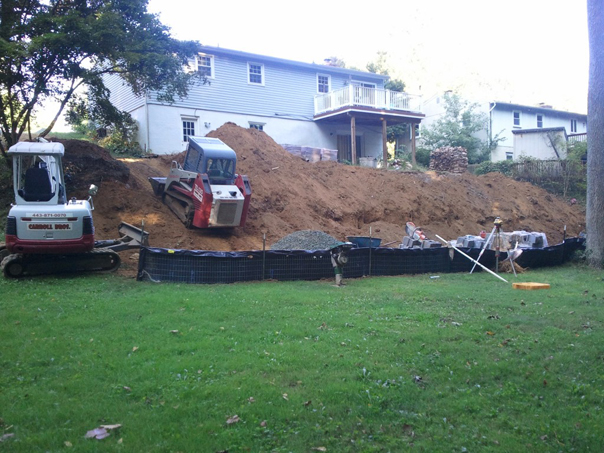 Carroll Bros. Contracting Extending the back yards useful area with a retaining wall - Arnold, MD